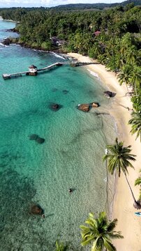 Discover the breathtaking beauty of Koh Kood Island, featuring soft sandy beaches, clear turquoise waters, and lush tropical foliage. This paradise is perfect for relaxation and adventure.