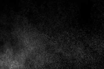 Fototapeta premium Water spray particle mist black background abstract texture