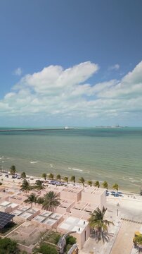 Progreso Merida Yucatan coast line sunset drone orbit reveal