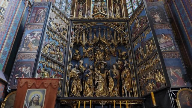 The Veit Stoss Altarpiece in Krakow is a late Gothic masterpiece. It features intricate, gilded wood carvings of biblical scenes within a monumental winged structure.