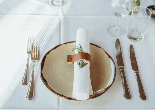 70 Beautifully set table with plate and napkin for dinner at a wedding