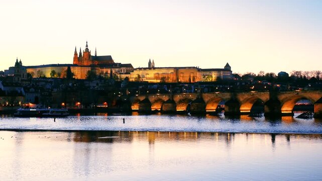 Enjoy the breathtaking views of Pragues iconic skyline and Charles Bridge as the sun sets over the Vltava River. This picturesque moment captures the essence of Czech beauty and history.