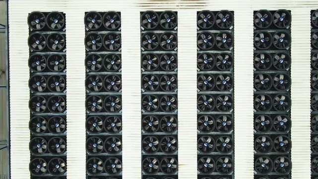 Aerial View of AI Data Center Cooling System Fans Spinning on a Rooftop