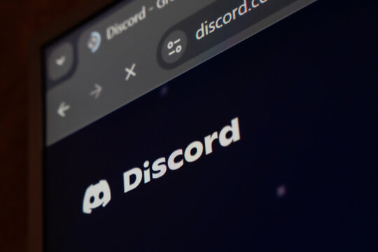 18 April 2026 - Tashkent, Uzbekistan: Close up view of Discord website on digital screen showing logo and interface elements.