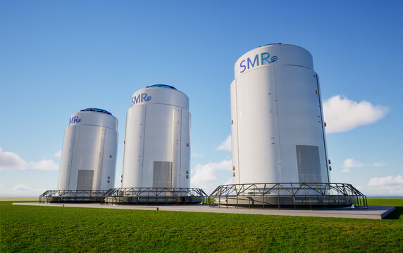 Group of smr or small modular nuclear reactors power plant against blue sky