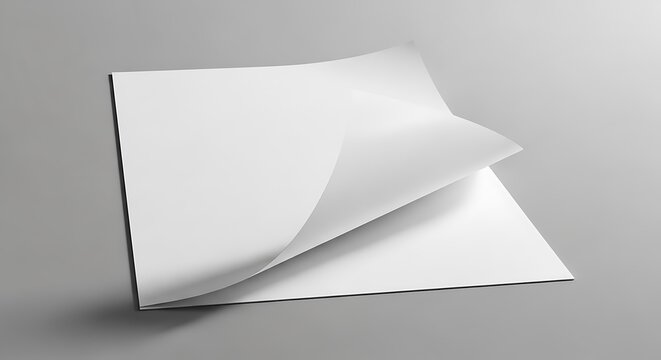 Blank white paper sheets with curled edge on gray background
