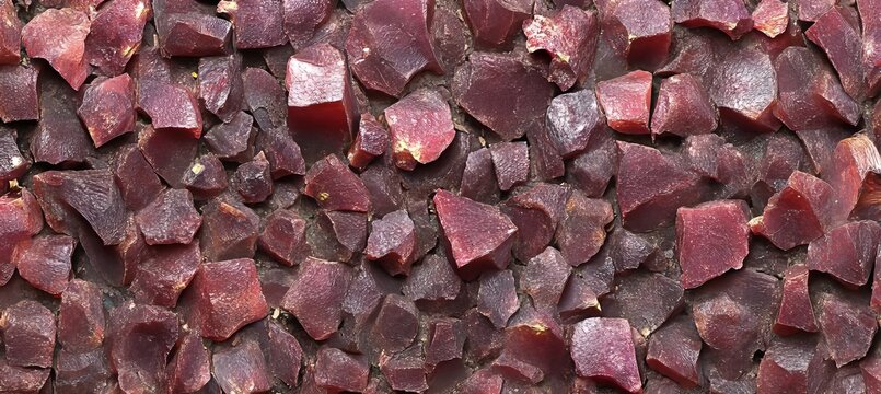 Tiled Texture of Glossy Dried Pomegranate Arils in Rich Ruby Red Creating Abstract Patterns, 4k HDR