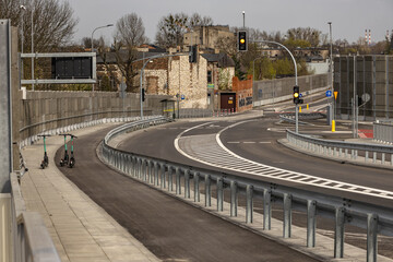 Construction of a new bridge in Częstochowa, the Jacek Magiera Viaduct, an asphalt road over the railway tracks, a road investment to improve urban traffic, an empty road in the city center, acceptanc © dominikspalek.pl