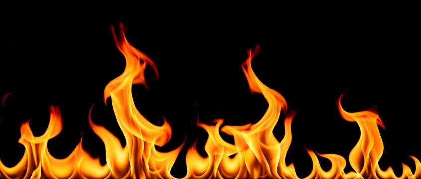Intense glowing fire flames rising upward against solid black background representing powerful thermal energy wild inferno dangerous hot fiery abstract element