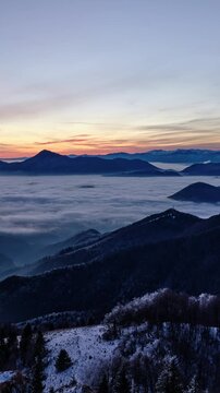 Vertical Mountain Sunrise Timelapse with Cloud Inversion