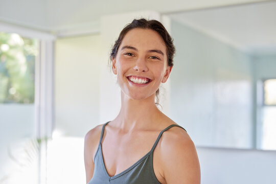 Portrait of smiling young natural beauty woman