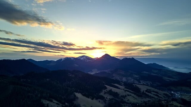 Aerial Hyperlapse of Mountain Sunset with Forward Motion