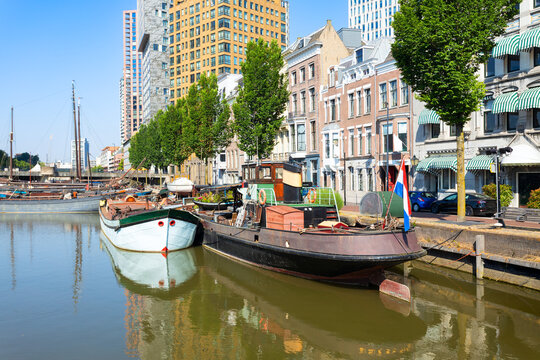 Wijnhaven harbor with historic tugboats in Rotterdam Netherlands