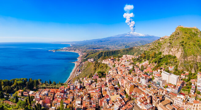 Taormina city, Etna volcano aerial panoramic view, Sicily