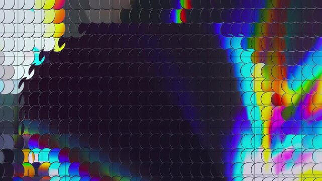 Abstract vibrant sequin pattern with iridescent metallic scales and colorful reflections creates a glamorous disco and fashion industry background