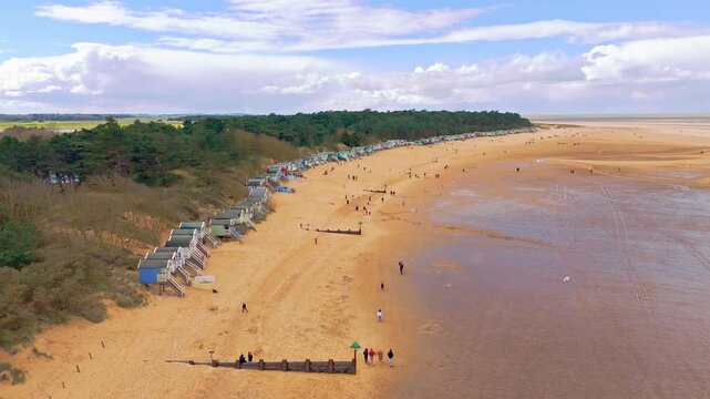 Wells Next to the Sea Beach. Sand dunes where Norfolk Coast path with beach huts and tourist beaches. Beach huts on the promenade at Gorleston-on-sea in Norfolk, UK