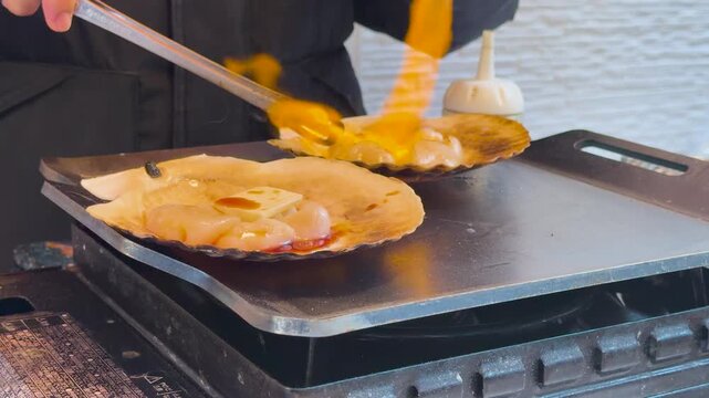 Japanese Street Food Chef Grilling Scallops with Butter and Soy Sauce