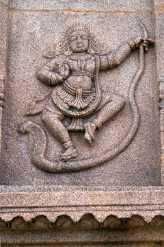 carved stone wall