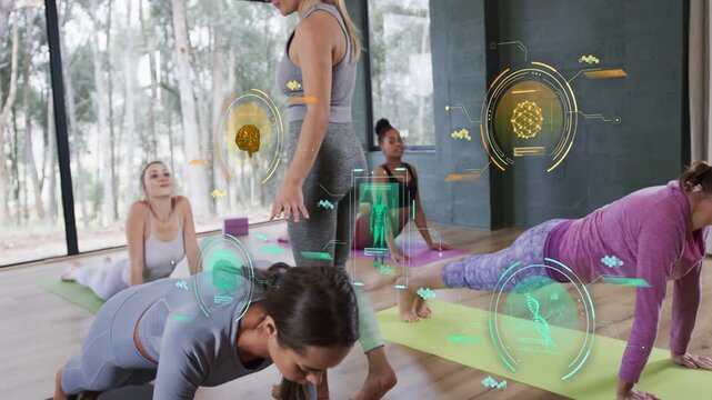 Teacher walking among mats, initiating yoga pose shifts while AR HUD tracking posture and alignment