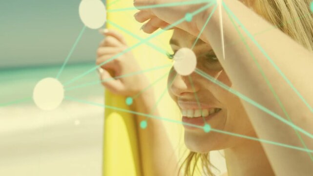 Woman shading eyes from sun holding yellow board, animated teal dots appearing over face for travel