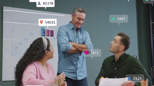 Seated man marking doc, team discussing marketing metrics, social likes floating and multiplying