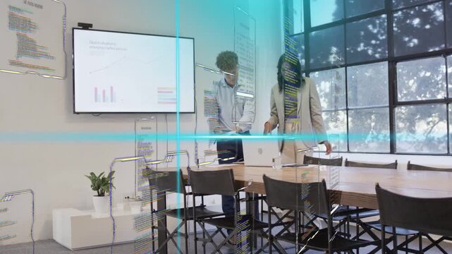 Biz colleagues opening folder, comparing laptop charts and papers, finalizing deck under cyan lines