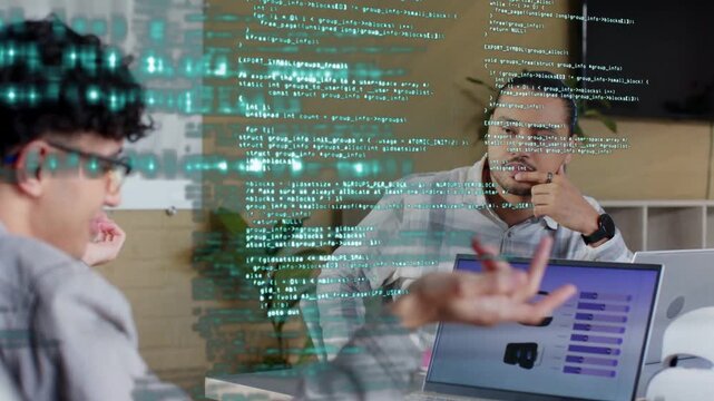Left man pointing laptop charts, right man nodding, starting data review, code overlay crossing