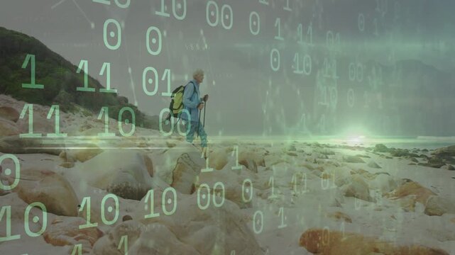 Woman hiker starting on rocks, using pole and pack while tech binary overlay showing horizon glow