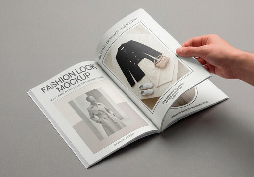 Hand flipping blank open book pages mockup on neutral background