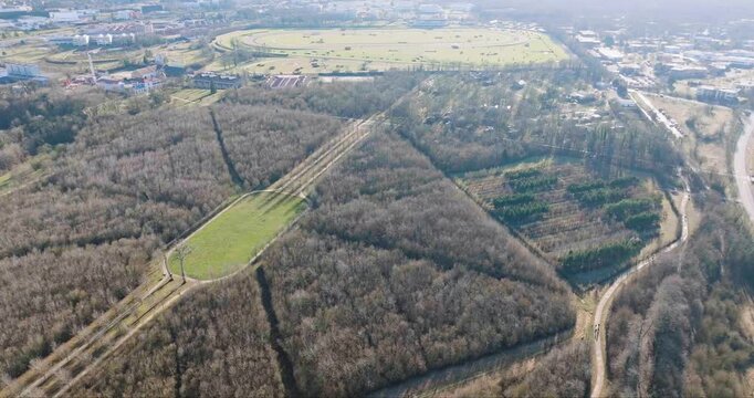 Aerial view of the For&ecirc;t de Haye with its geometric paths cutting through the trees, and the racecourse in the background, Nancy, France.