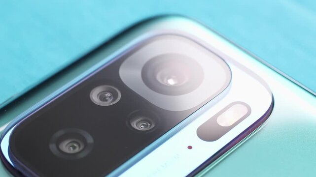 Macro close up of a smartphone camera lens on back
