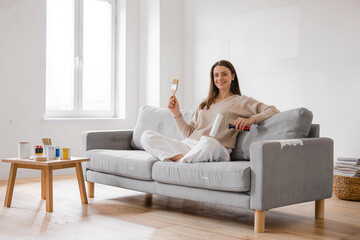 Fototapeta premium Enjoying a moment of creativity while painting at home