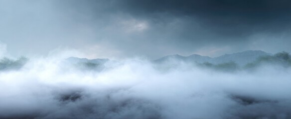 Obraz premium Dense fog and wispy haze floating low against a soft background