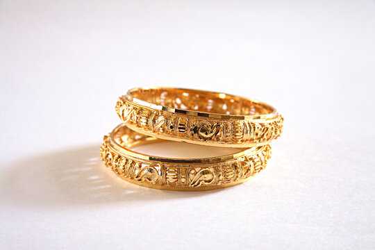 two gold bangles
