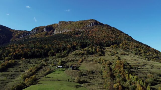 Majestic mountain landscape with rural hillsides at daytime