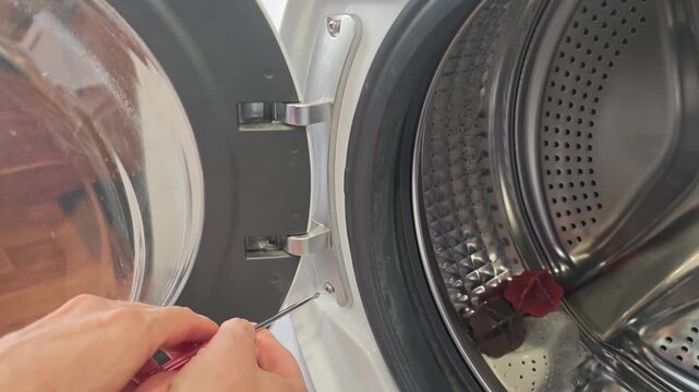 How to fix a washing machine door latch at home with simple tools