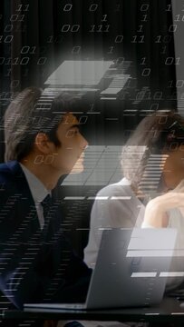 Vertical video: Suited man leaning to read laptop after woman gesturing in business, binary overlay