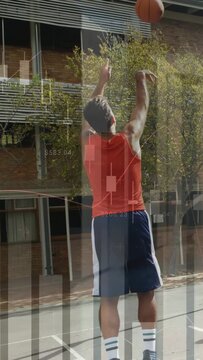 Vertical video: Shooter sizing hoop, shooting jump shot, chart overlay tracking for sports scoring