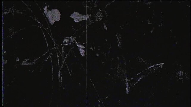 Flickering noisy grunge style film effect overlay loop.
