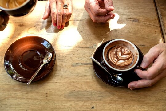Coffee meeting with latte art.