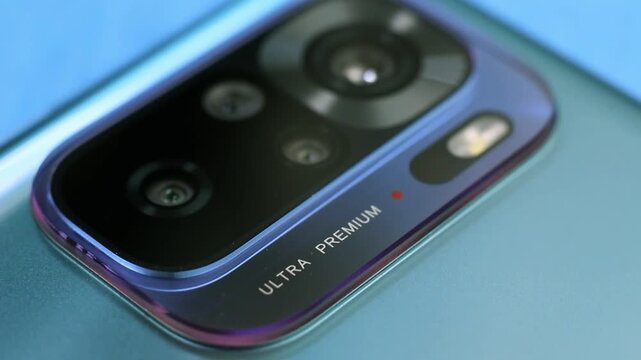 Macro close up of a smartphone camera lens on back
