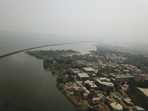 Aerial view of the University of Lagos and Third Mainland Bridge, a blend of academic architecture and infrastructural marvel, Oworonshoki, Lagos, Nigeria.