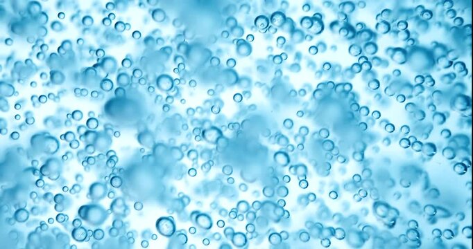 Abstract blue water bubbles background with floating air spheres.