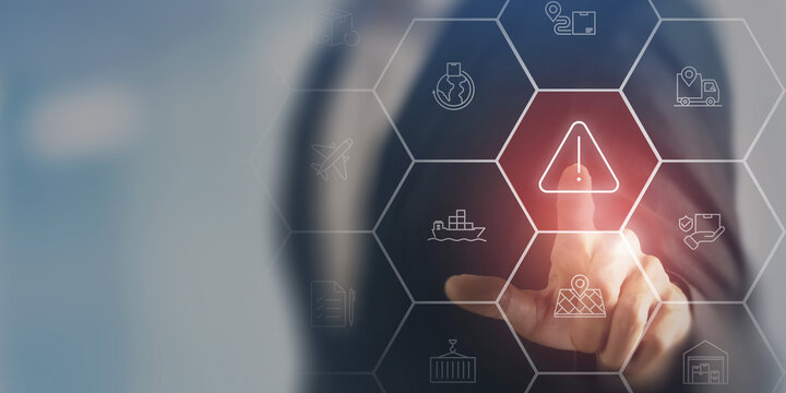 Supply chain disruption risk and logistics crisis management. Pressing warning icon on digital logistics interface. Supply chain risk management and crisis impact on global distribution systems.