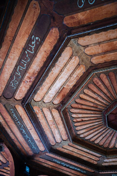 Sarajevo, Bosnia and Herzegovina - 07 May 2025: View of the intricately designed ceiling featuring octagonal patterns, radiating lines, and elegant inscriptions in a historical building.
