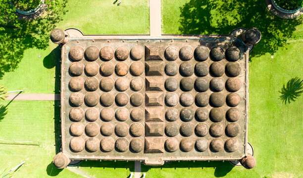 Aerial view of the Sixty Dome Mosque, a UNESCO World Heritage Site, stands majestically amidst manicured green lawns, Bagerhat, Khulna Division, Bangladesh.