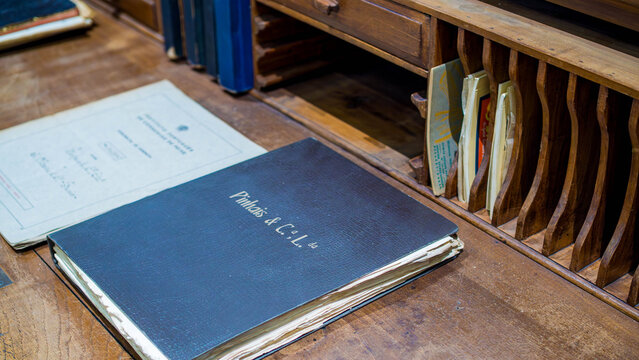 Pinhais sardines factory, vintage company ledger book on wooden desk archive display, Matosinhos city near Porto, Portugal, 8th April 2026 pinhais sardinhas