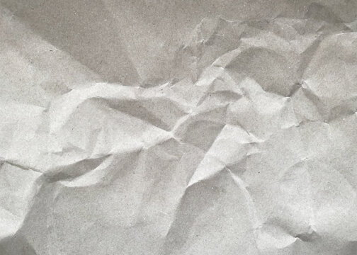 Crumpled craft paper texture. Realistic crumpled cardboard background. Horizontal wrinkled textured empty craft paper or cardboard sheet. Vector.