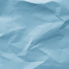 Obraz premium Textured blue crumpled paper background