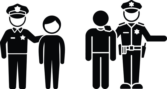 Two police officers escorting individuals in a controlled manner